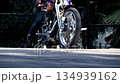 Riding through vibrant streets at sunset, capturing the pulse of adventure and freedom on two wheels 134939162