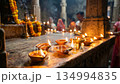 Close Up of Diya Lamps Glowing Inside Temple During Ram Navami 134994835