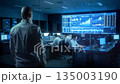 Market Supervisor Assesses Daily Performance Metrics And Trends Within Busy Trading Floor Atmosphere 135003190