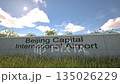 Arrivals at Beijing Capital International Airport with airplane landing near terminal, Beijing, China 135026229