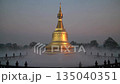 Golden pagoda in the mist 135040351