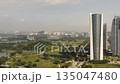 Cityscape of Putrajaya with modern buildings and green park areas 135047480