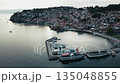 Aerial footage of the docks and the city of Ohrid on the lake, North Macedonia 135048855