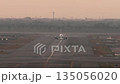 Footage of an airplane taxiing, front view 135056020