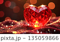 Faceted crystal heart with a red glow, surrounded by soft bokeh lights, creating a warm and romantic atmosphere 135059866