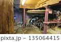 Interior of an old water mill 135064415