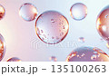 Light pink transparent spheres floating in a loop of beauty ingredients | Collagen and Niacinamide style 3D abstract background 135100263