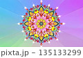 Ornate colorful mandala pattern on rainbow gradient background. 135133299