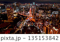 Time-lapse night view of Akabanebashi intersection from the observation deck of Tokyo Tower, zoomed out 135153842