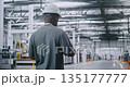 Male Technical Manager Standing and Surveying Massive Scale of Modern Industrial Facility 135177777