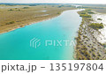 Aerial view of turquoise river flowing through natural landscape in Bacalar Mexico 135197804