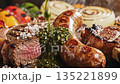 Extreme close-up view of a mouth-watering mixed grill platter featuring a thick beef steak topped with sea salt and a savory grilled sausage 135221899