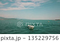 Experience a Scenic Boat View on a Serene Water Body located in the beautiful landscapes of Russia 135229756