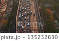 Traffic flows smoothly on a busy highway in Hangzhou, China during the late afternoon light 135232630