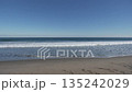 Sea, blue sky, horizon and sandy beach (top half blue sky) 135242029