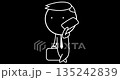 Businessman walking and talking on the phone 135242839