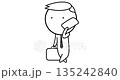 Businessman walking with a briefcase and talking on the phone 135242840