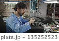 A technician assembles a computer in the lab 135252523