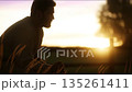 Silhouette Of Man In Golden Evening Field, Rural Man Bows In Prayer During Sunset Illumination 135261411