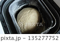dough being kneaded in a bread maker, close-up. High quality 4k footage 135277752