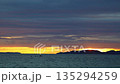 Magnificent sunset on a cloudy day over the Aegean Sea in autumn.	 135294259