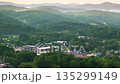 Brevard, North Carolina. Small town America in the Blue Ridge Mountains. Historic red brick architecture, narrow streets, and charming downtown in Transylvania County. 135299149