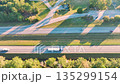 American highway with fast moving traffic. Interstate transportation concept 135299154