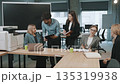 Collaboration among colleagues in an office setting during work hours 135319938