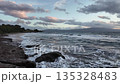 A lighthouse surrounded by rocks in a windy and choppy Aegean Sea. Akyarlar, Bodrum. 135328483