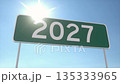 Highway Road Sign With 2027 Under Bright Blue Sky and Sunlight 135333965