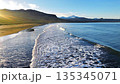 Cinematic Sunrise over Black Sand Volcanic Beach with Crashing Waves, Serene and Tranquil Landscape. Iceland. 135345071