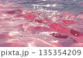 Transparent pink crystal sand beach and sparkling pink water surface with rippling waves background video 135354209