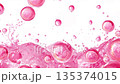 Pink splashes and large bubbles falling from top to bottom in slow motion on a white background. 135374015