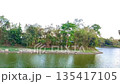 Beautiful riverside scenery with mountains creating peaceful natural atmosphere 135417105