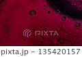 Dynamic red chemical reaction, dark abstraction. Liquid explosion, liquid reaction, dark ink, macro view 135420157