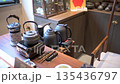 Heating Water And Brewing Tea With Modern Teapots On Display 135436797