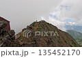 Akadake peak covered in clouds 135452170