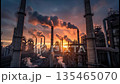Industrial area at dusk and smoke billowing 135465070