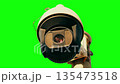 Security CCTV camera moving and scanning on green screen background 135473518