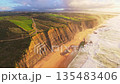 Magoito Beach and Cliffs at Sunset. Atlantic Ocean, Portugal. Aerial View 135483406