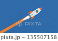 A rocket rising into the blue sky. A symbol of business leaps and success. A sense of speed and hope for the future. 135507158