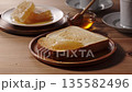 Drizzle honey on toast 135582496