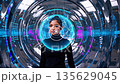 Futuristic technology concept: Indian woman in digital interface surrounded by neon holographics 135629045