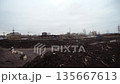 An organic waste treatment plant operating The Industrial Conveyor System Aerator processes organic waste using steam rising inside the waste treatment plant. General plan and scale of organic waste 135667613