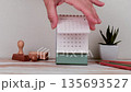 April 2027 Calendar Showing Date Four On Desktop With Office Objects 135693527