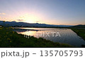 Azumino City, Nagano Prefecture: The Northern Alps and Mount Ariake at sunset, with a beautiful reflection in the rice paddies 135705793