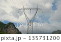 Electrical towers and wires in mountains 135731200