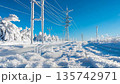 Frosted landscape with power lines and bright blue sky on a cold winter day 135742971