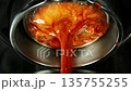 Macro Shot of Espresso Extraction from Naked Portafilter , Slow Motion 135755255