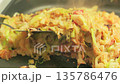 Monjayaki grilled on a hot plate: A close-up video of Japanese downtown gourmet food 135786476
